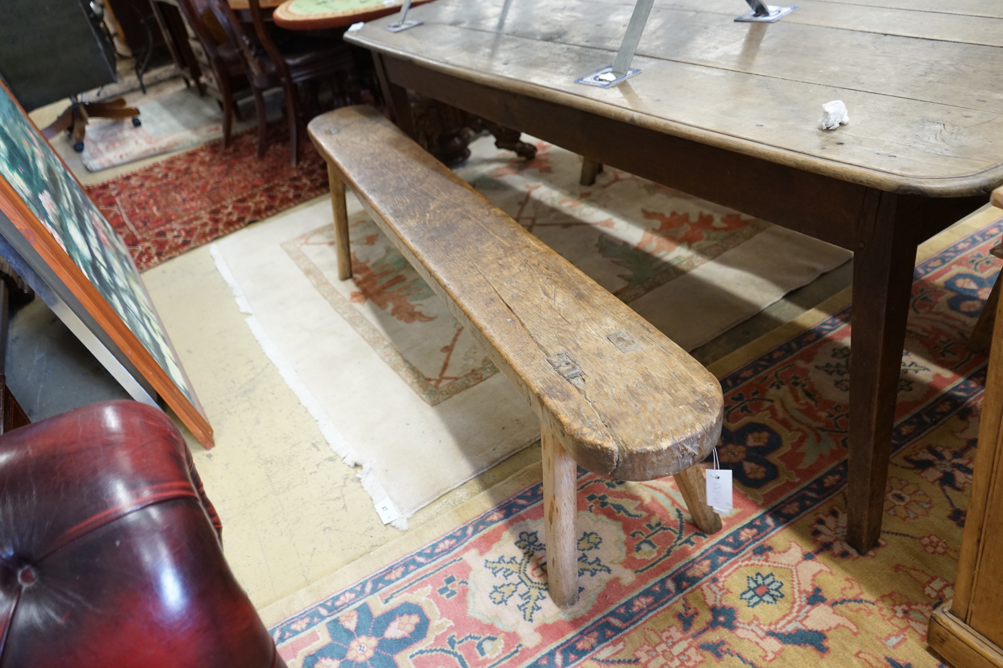 A pair of 19th century provincial elm and beech bench seats, length 199cm, depth 23cm, height 48cm